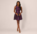 Sleeveless Floral Jacquard Drop Waist Short Dress In Navy Plum