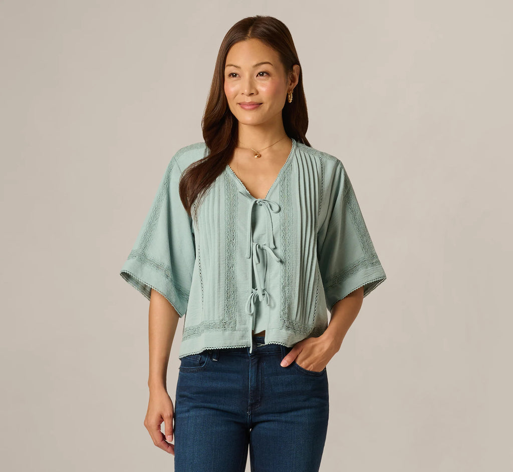 Short Sleeve Pintuck Lace Tie Front Top In Dusty Seamist