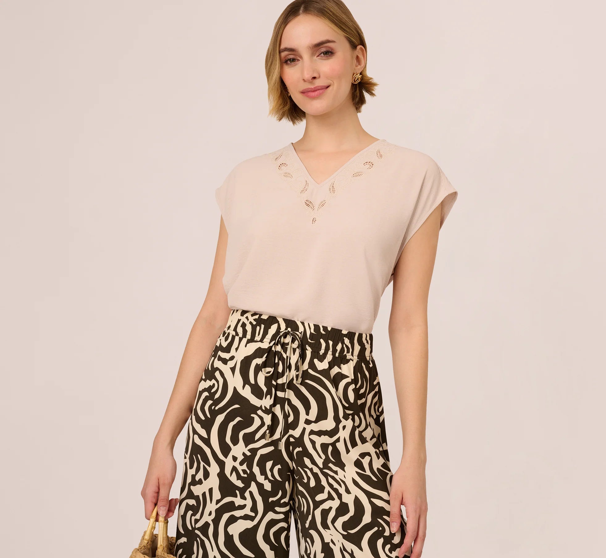 Sleeveless Embroidered V Neck Top In Pebble