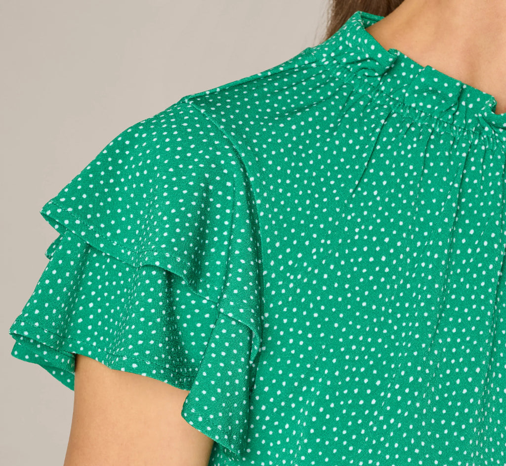 Double Flutter Sleeve Ruffle Neck Top In Vivid Green Broken Dot