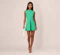 Sleeveless Romper With Peplum Hem In Flora Green