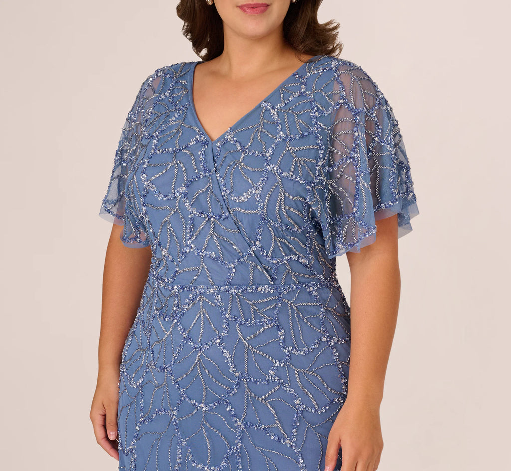 Plus Size Flutter Sleeve Surplice Beaded Gown In French Blue