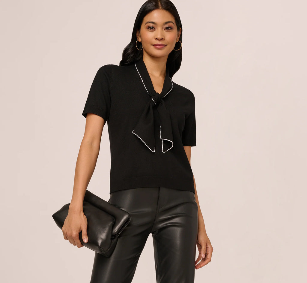 Short Sleeve Pearly Tie Neck Knit Top In Black