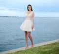 All Over Lace Short Skirt With Slight Puff Shoulders In Ivory Nude